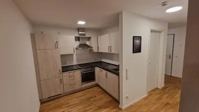 Küche/Küchenzeile in der Unterkunft Moderne, barrierefreie Wohnung im Herzen der Stadt mit Parkplatz, WLAN und TV - Marta