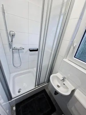 Ein Badezimmer in der Unterkunft Business Apartment am Bergmannsheil KH Wlan