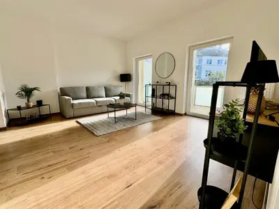 Ein Sitzbereich in der Unterkunft FeWo Palmtrees - Große und moderne 2 Zimmerwohnung mit Süd-West Balkon in Gladbeck-Mitte nähe Movie Park und Arena AufSchalke