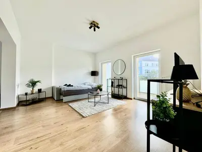 Ein Sitzbereich in der Unterkunft FeWo Palmtrees - Große und moderne 2 Zimmerwohnung mit Süd-West Balkon in Gladbeck-Mitte nähe Movie Park und Arena AufSchalke