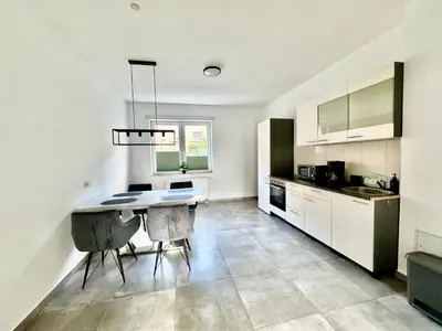 Küche/Küchenzeile in der Unterkunft FeWo Palmtrees - Große und moderne 2 Zimmerwohnung mit Süd-West Balkon in Gladbeck-Mitte nähe Movie Park und Arena AufSchalke