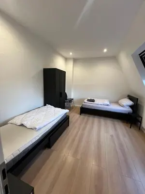 Ein Bett oder Betten in einem Zimmer der Unterkunft Moderne Ferienwohnung