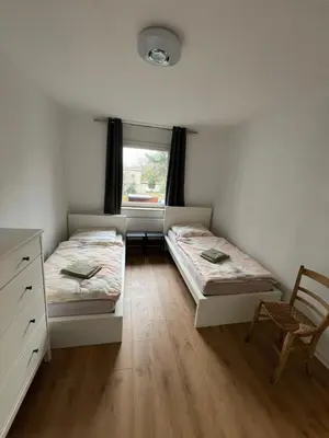 Ein Bett oder Betten in einem Zimmer der Unterkunft Moderne Ferienwohnung