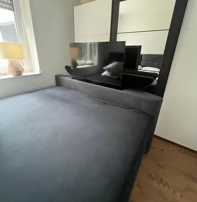 Ein Bett oder Betten in einem Zimmer der Unterkunft Schöne unterkunft