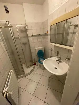 Ein Badezimmer in der Unterkunft MAD Ferienwohnungen 1