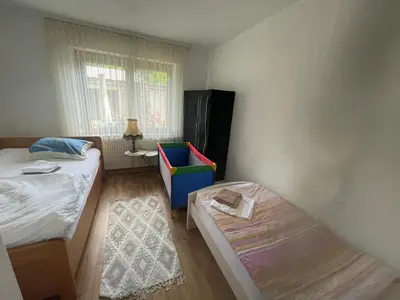 Ein Bett oder Betten in einem Zimmer der Unterkunft MAD Ferienwohnungen 1