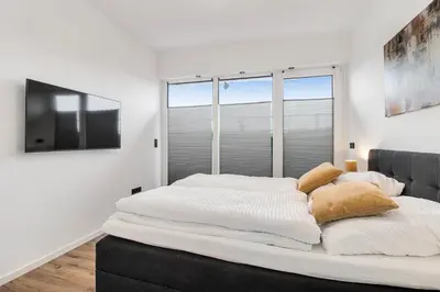 Ein Bett oder Betten in einem Zimmer der Unterkunft 24-7 Living - Lüdinghausen Apartments