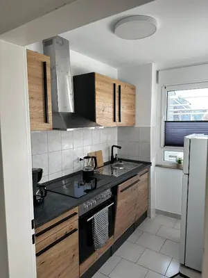 Küche/Küchenzeile in der Unterkunft 24-7 Living - Lüdinghausen Apartments