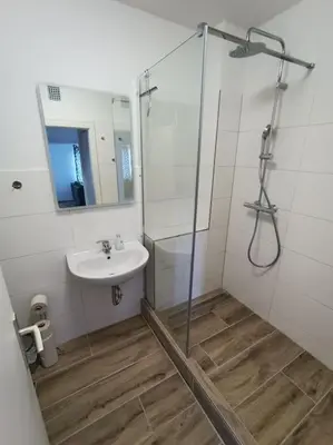 Ein Badezimmer in der Unterkunft Comfortable Apartment with balcony
