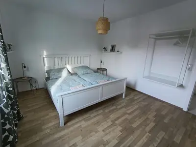 Ein Bett oder Betten in einem Zimmer der Unterkunft Comfortable Apartment with balcony