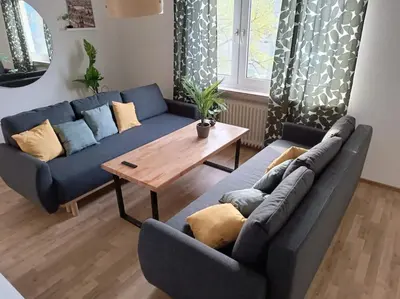 Ein Sitzbereich in der Unterkunft Comfortable Apartment with balcony