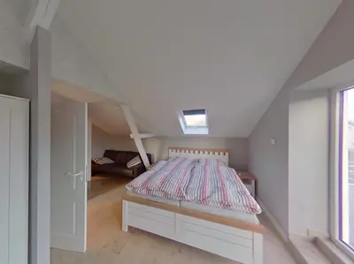 Ein Bett oder Betten in einem Zimmer der Unterkunft Alte Bäckerei Haupthaus am Flughafen - Messe Düsseldorf