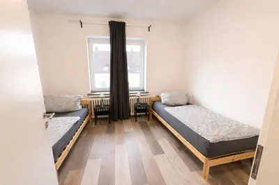 Ein Bett oder Betten in einem Zimmer der Unterkunft Monteurwohnungen Essen Kudox Living