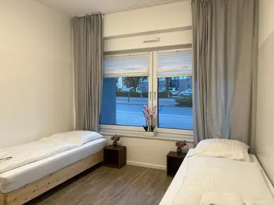 Ein Bett oder Betten in einem Zimmer der Unterkunft T&K Apartments- 2 Room Apartment - Heart of Solingen - Private parking