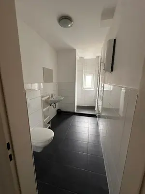 Ein Badezimmer in der Unterkunft Ferien- Monteurapartments nähe Veltins Arena