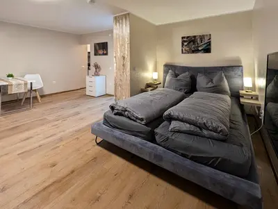 Ein Bett oder Betten in einem Zimmer der Unterkunft H-Aparts Essen - TOP Apartments in Best-Lage
