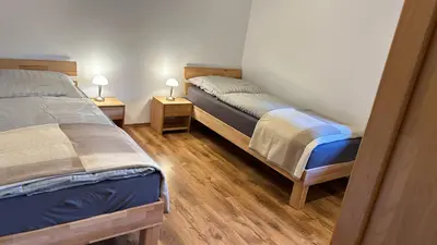 Ein Bett oder Betten in einem Zimmer der Unterkunft Willkommen bei Iva