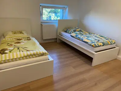 Ein Bett oder Betten in einem Zimmer der Unterkunft Moderne Ferienwohnung