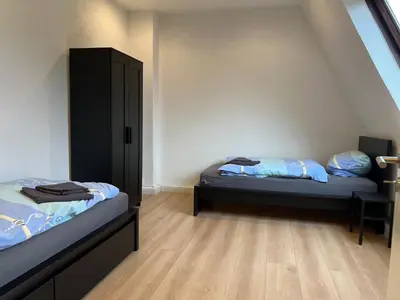 Ein Bett oder Betten in einem Zimmer der Unterkunft Moderne Ferienwohnung