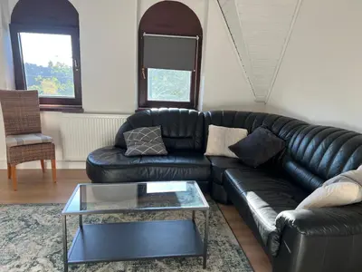 Ein Sitzbereich in der Unterkunft Moderne Ferienwohnung