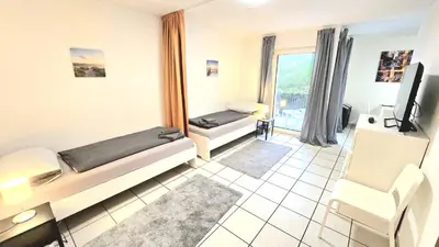 Ein Bett oder Betten in einem Zimmer der Unterkunft -CS24- Apartment with 2 beds and terrace - MF01