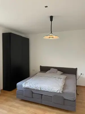 Ein Bett oder Betten in einem Zimmer der Unterkunft Tolle 2-Zimmer Wohnung in Elberfeld