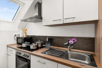 Küche/Küchenzeile in der Unterkunft MOLA Apartments-Charmante Ferienwohnung im Herdecke Zentrum für 3 Personen-große Dachterrasse-Grill-Gratis Parken-WLAN