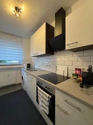 Küche/Küchenzeile in der Unterkunft Zentrale ,moderne und stilvolle Wohnung nähe Klinik und Messe