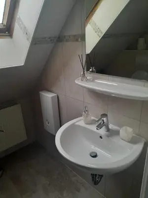 Ein Badezimmer in der Unterkunft Wohnung Mg