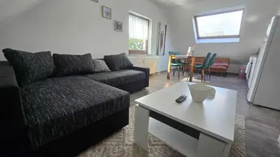 Ein Sitzbereich in der Unterkunft Wohnung Mg
