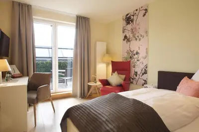 Ein Bett oder Betten in einem Zimmer der Unterkunft Jammertal Resort