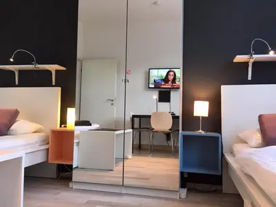 Ein Bett oder Betten in einem Zimmer der Unterkunft HertenFlats - Rooms & Apartments - Kreis Recklinghausen