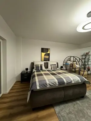 Ein Bett oder Betten in einem Zimmer der Unterkunft Zeitperlewohnen Mocca