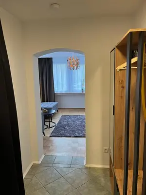 Ein Bett oder Betten in einem Zimmer der Unterkunft Ferienwohnung Drei Rosen