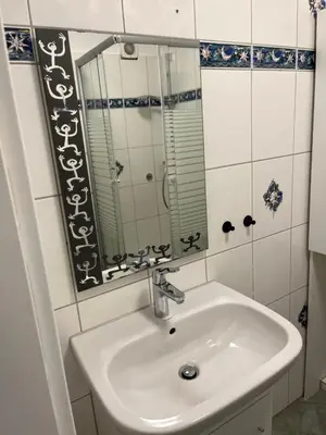 Ein Badezimmer in der Unterkunft Ferienwohnung Drei Rosen
