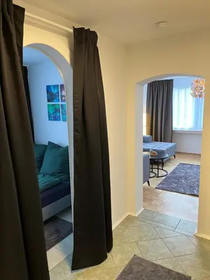 Ein Bett oder Betten in einem Zimmer der Unterkunft Ferienwohnung Drei Rosen