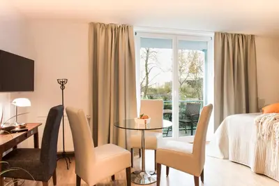 Ein Bett oder Betten in einem Zimmer der Unterkunft Parkside Apartment House