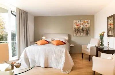 Ein Bett oder Betten in einem Zimmer der Unterkunft Parkside Apartment House