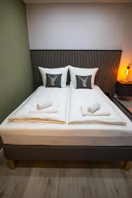 Ein Bett oder Betten in einem Zimmer der Unterkunft Apartment 