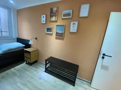 Ein Bett oder Betten in einem Zimmer der Unterkunft Sahara 3,5 Z Balkon Smart TV Küche WaMa