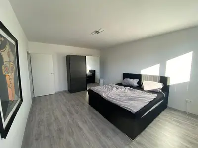Ein Bett oder Betten in einem Zimmer der Unterkunft Moderne und möblierte Wohnung!
