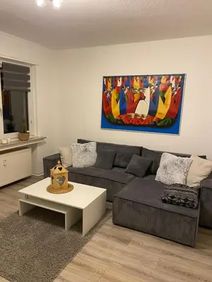 Ein Sitzbereich in der Unterkunft Schöne Ferienwohnung mit Terrasse, nur 2 Minuten zur Autobahn