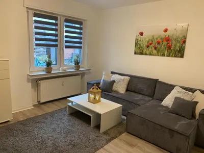 Ein Sitzbereich in der Unterkunft Schöne Ferienwohnung mit Terrasse, nur 2 Minuten zur Autobahn