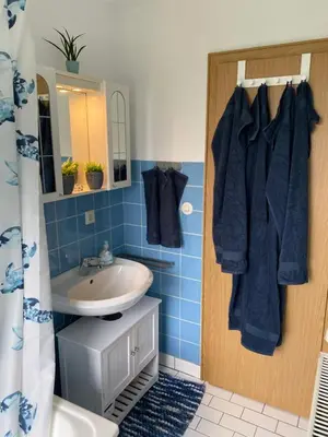 Ein Badezimmer in der Unterkunft Schöne Ferienwohnung mit Terrasse, nur 2 Minuten zur Autobahn