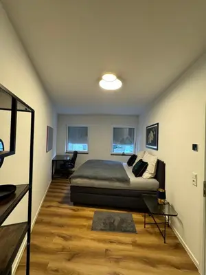Ein Bett oder Betten in einem Zimmer der Unterkunft Zeitperlewohnen Petrol