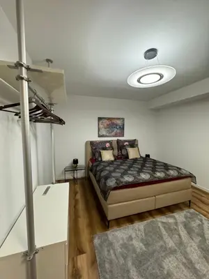 Ein Bett oder Betten in einem Zimmer der Unterkunft Zeitperlewohnen Beige