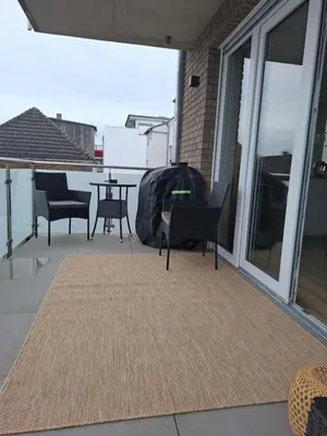 Ein Balkon oder eine Terrasse in der Unterkunft Luxsuite Still und Komfort 1 Balkon Grill TV-75 Zoll