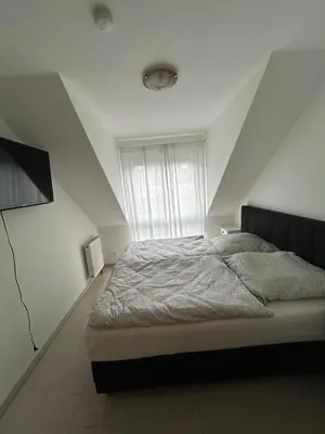 Ein Bett oder Betten in einem Zimmer der Unterkunft Ferienwohnung- Nußberg
