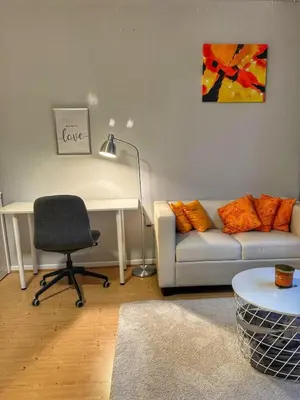 Ein Sitzbereich in der Unterkunft 1 Zimmer Apartment