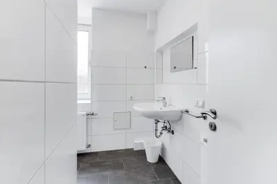 Ein Badezimmer in der Unterkunft BEGE APARTMENTS Corporate Corner